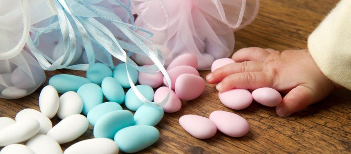 13486956 - a candy favors with baby hand